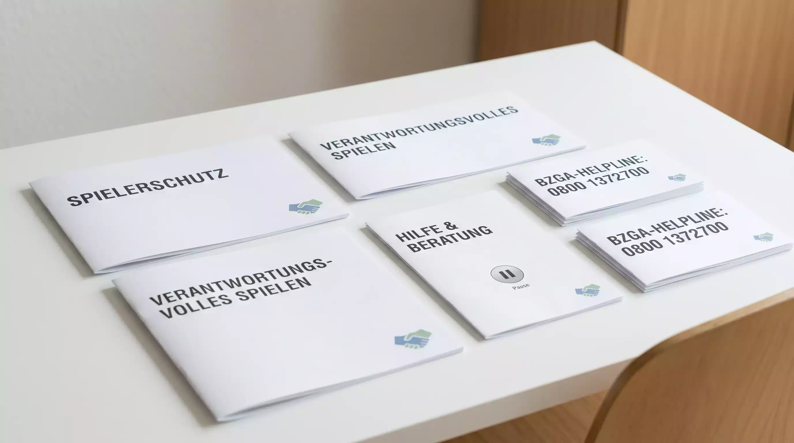 Wettsucht-Prävention bei Sportwetten: GGL-Spielerschutz-Materialien mit OASIS-Selbstsperre und BZgA-Beratungshinweisen für problematisches Wettverhalten